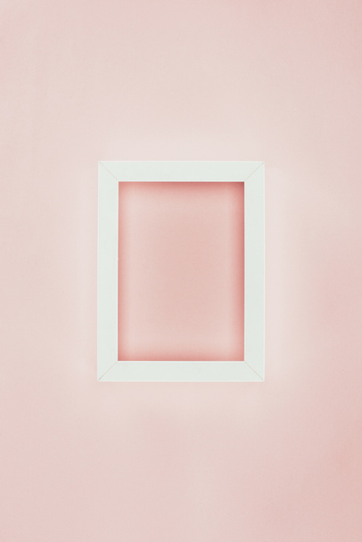 white empty wooden frame on pink background - Φωτογραφία, εικόνα