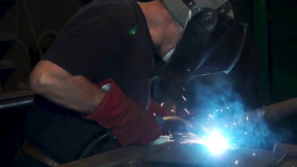 Industrial Worker at the refinery welding close up. Metal sawing close up. Clip. Close-up of welder working in workshop - Footage, Video