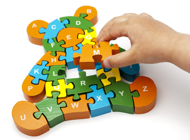 drewniane puzzle niedźwiedź - Zdjęcie, obraz