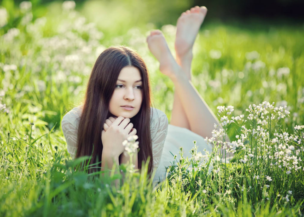 girl lying on a meadow - Photo, Image