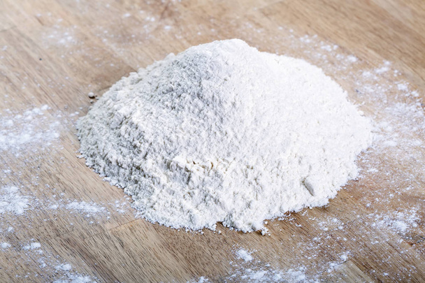 Heap of flour on table. - Photo, Image