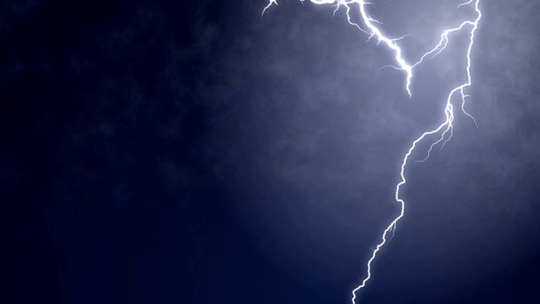 Summer lightning striking down, natural phenomenon in action, meteorology - Photo, Image