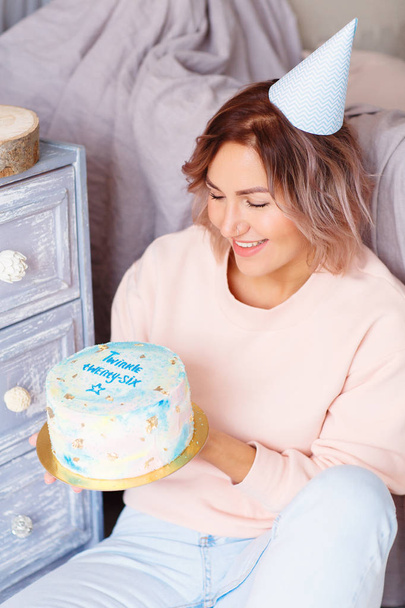 Beautiful happy woman her birthday. Girl with cake. Celebrating concept - Φωτογραφία, εικόνα