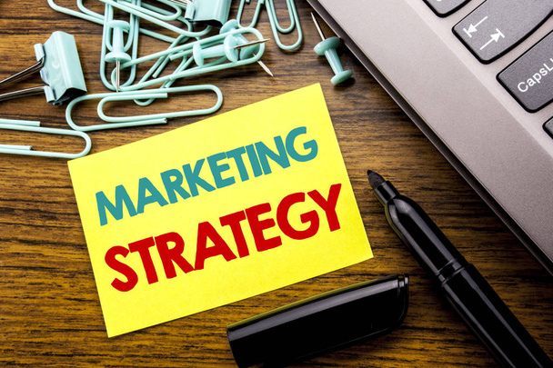 Handwriting Announcement text showing Marketing Strategy. Business concept for Success Digital Plan written on sticky note paper on the wooden background next to the laptop keyboard With marker - Photo, Image