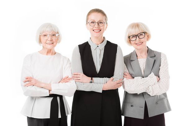Stylish businesswomen in eyeglasses with crossed arms isolated on white - Photo, Image