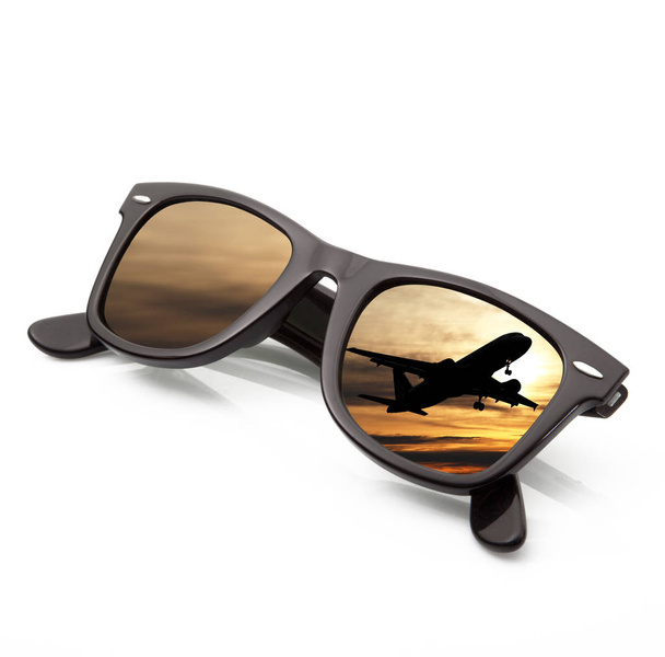 sunglasses with airplane in white background - Photo, Image
