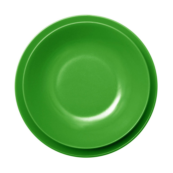 tyhjä vihreä ruokalaji valkoisella taustalla
 - Valokuva, kuva