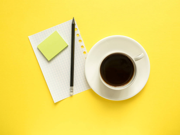 Business flat lay with copy space, calculator, pencil, Notepad, coffee glasses on colorful yellow background - Φωτογραφία, εικόνα
