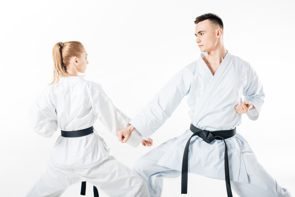 karate fighters training block isolated on white - Zdjęcie, obraz
