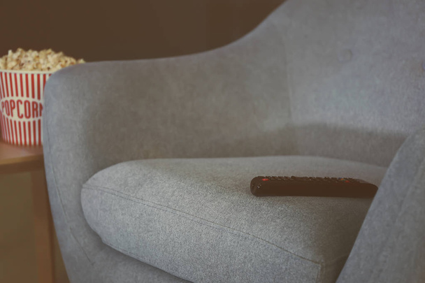 Comfortable armchair with remote control   - Fotografie, Obrázek