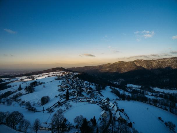 aerial view of beautiful winter landscape with hills and buildings, Germany - Photo, Image