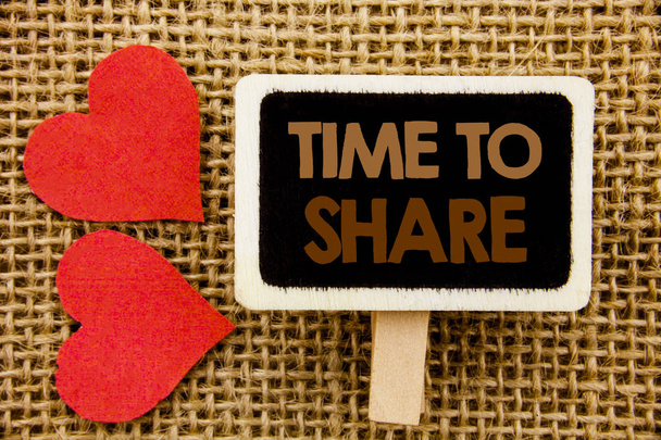Conceptual hand text showing Time To Share Question. Business photo showcasing Your Story Sharing Feedback Suggestion Information  written on blackboard on the textured background with Love Heart - Photo, Image
