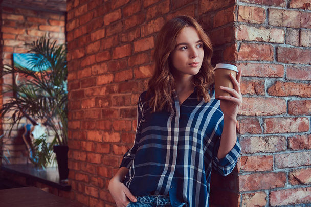 Portrait of a young hipster girl drinks morning coffee  - Fotoğraf, Görsel