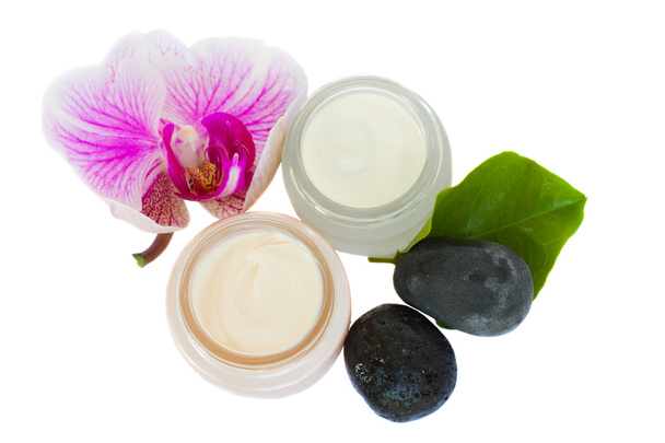 Beauty creams with orchid and spa stones - Valokuva, kuva