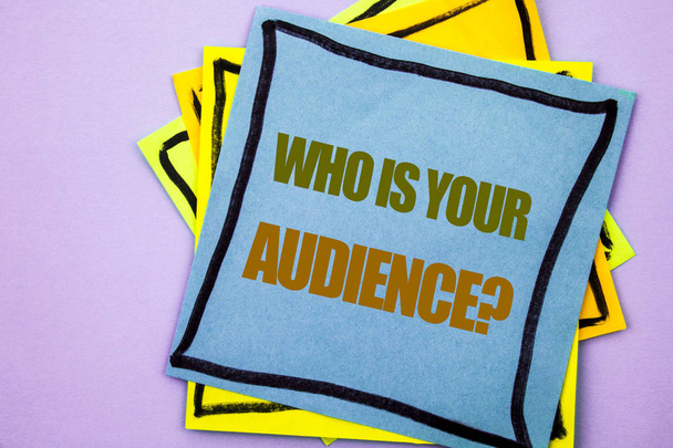 Writing text showing  Who Is Your Audience Question. Business photo showcasing Customer Target Service Client Research written on sticky note paper on the pink background. - Photo, Image