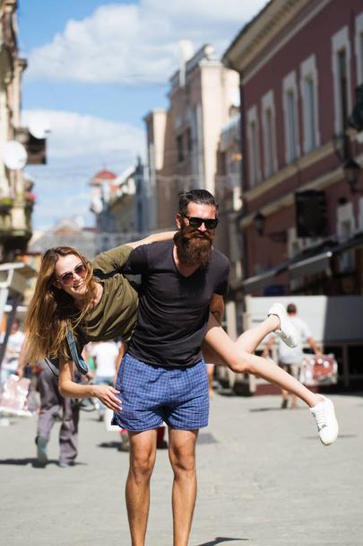 Fashion couple in love on summer vacation. - Фото, изображение