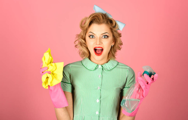 Retro woman cleaner on pink background. - 写真・画像