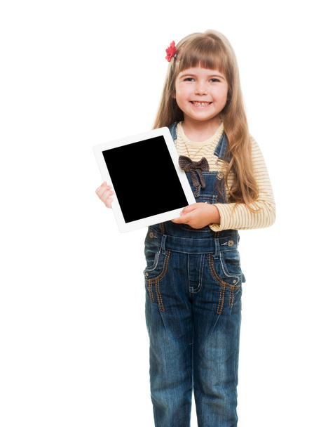 Söpö pieni tyttö yllään farkut yleistä poseeraa studiossa whi
 - Valokuva, kuva