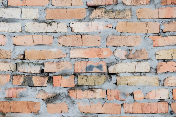 Old brick wall, old texture of red stone blocks closeup - Φωτογραφία, εικόνα
