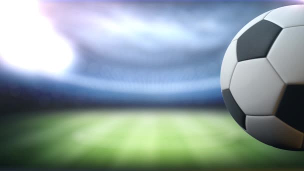 Футбольный мяч вращается на фоне стадиона в правой части с местом для названия, логотипа или счет фон 4K Ultra HD. - Кадры, видео