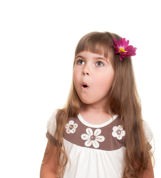 Cute little girl very surprised and looking up somewhere - Photo, Image