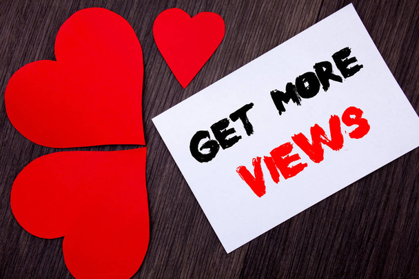 Writing text showing  Get More Views. Concept meaning More Traffic Leads Online Page Promotion Popularity Traffic written on notobook paper note on the wooden background with Love Heart. - Photo, Image