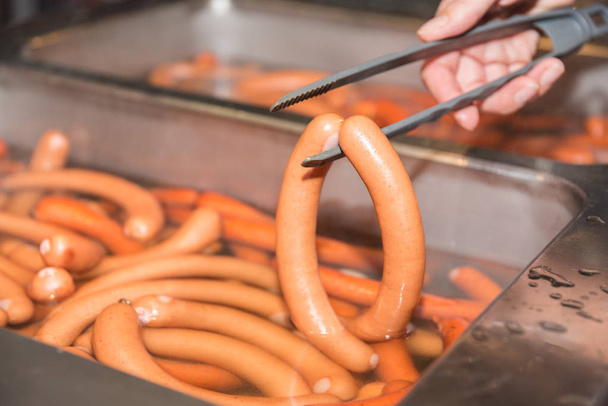 Frankfurter sausages are heated - Photo, Image