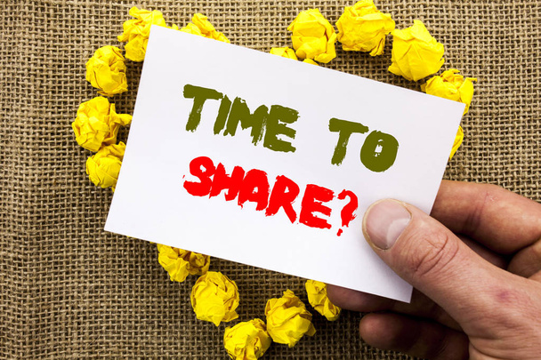 Handwritten text sign showing Time To Share Question. Conceptual photo Your Story Sharing Feedback Suggestion Information  written on Sticky Note Paper With Heart Holding Hand with Finger. - Photo, Image