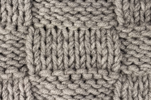 Lavorare a maglia. Grigio maglia tessuto texture sfondo o maglia modello sfondo
 - Foto, immagini