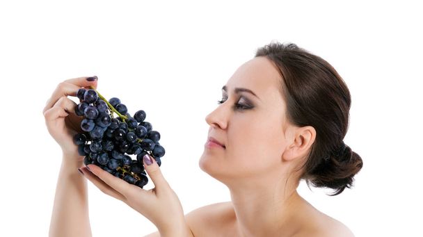 young woman with grape - Zdjęcie, obraz