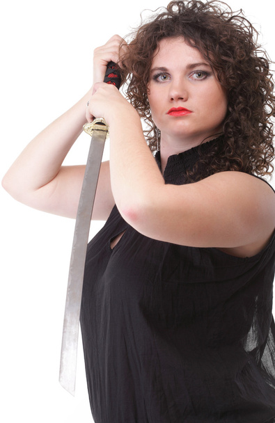 Portrait curly woman curly girl and sword - Φωτογραφία, εικόνα