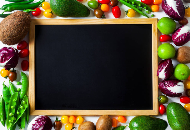 slate board for writing as copy space and different vegetables a - Foto, Bild