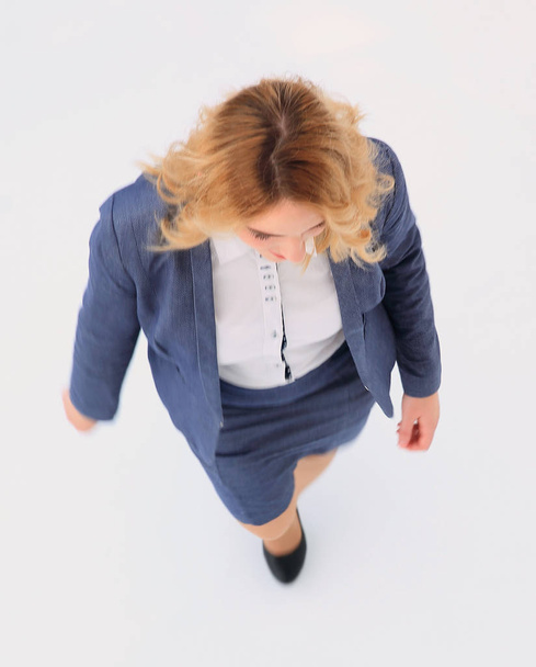 view from the top. business woman stepping forward . - Foto, Bild