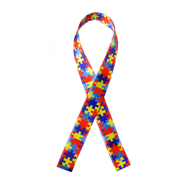 World Autism awareness and pride day or month with Puzzle pattern ribbon on white background. - Photo, image