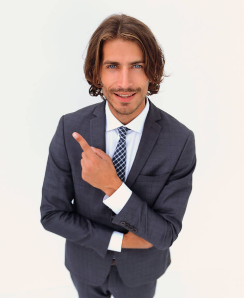 Handsome businessman showing finger point up - Foto, afbeelding