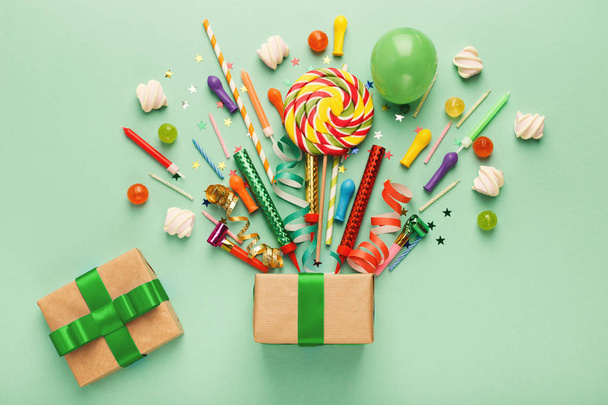 Birthday party background with gift and lollipops - Zdjęcie, obraz