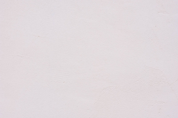 Fundo de um estuque branco revestido e pintado exterior, elenco áspero de textura de cimento e parede de concreto, revestimento rústico decorativo
 - Foto, Imagem