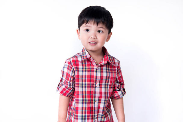 Portrait of cute asia boy in the red plaid shirt.  - Photo, Image