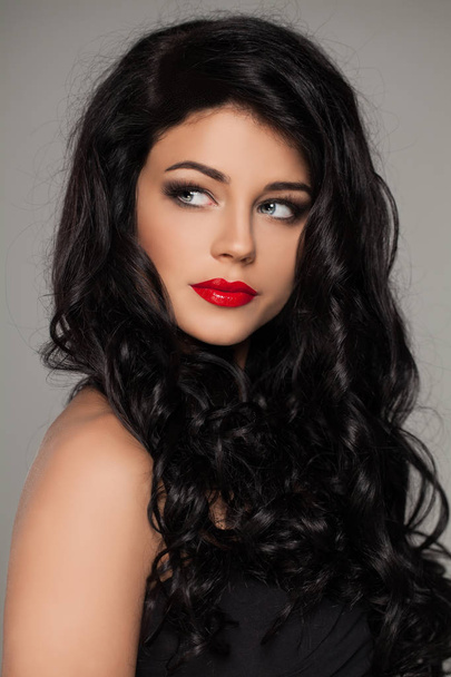 Elegant Woman. Perfect Makeup. Long Dark Curly Hair - Photo, Image