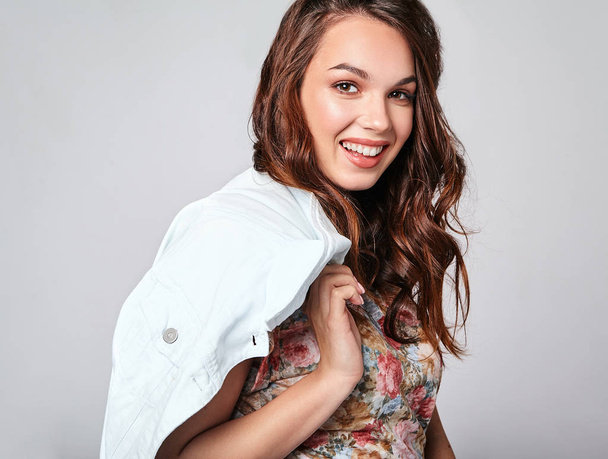 Portrait of young stylish laughing girl model in colorful casual summer clothes with natural makeup isolated on gray background. Looking at camera - Fotografie, Obrázek