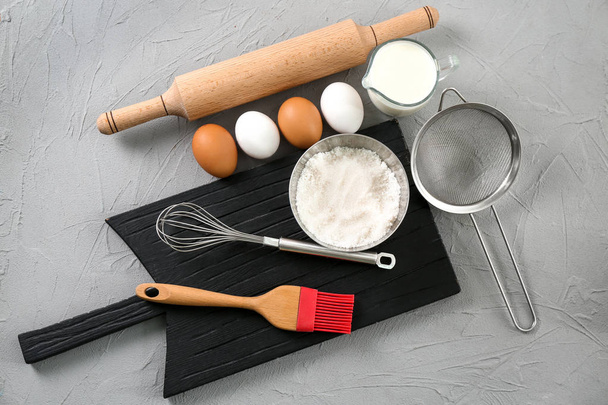 Set of kitchenware and products on grey background. Cooking master classes - Foto, Imagen