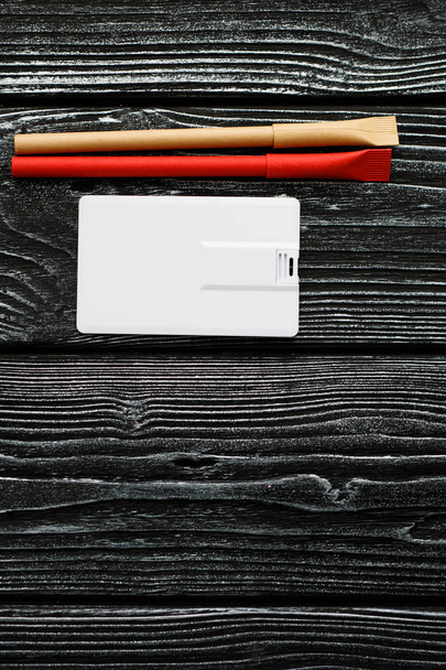 Workspace with envelope, wallet, business usb flash card card, pen.  - Фото, зображення