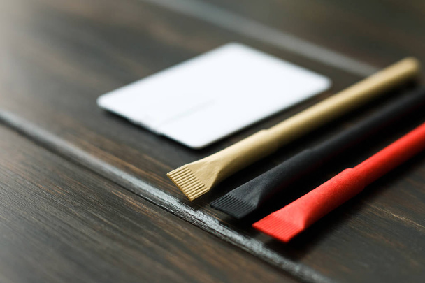 Workspace with envelope, wallet, business usb flash card card, pen.  - Фото, изображение