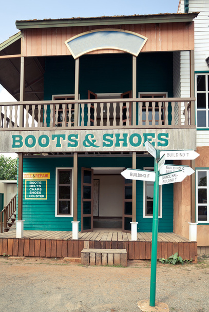 Casa de botas en estilo Wild West
 - Foto, Imagen