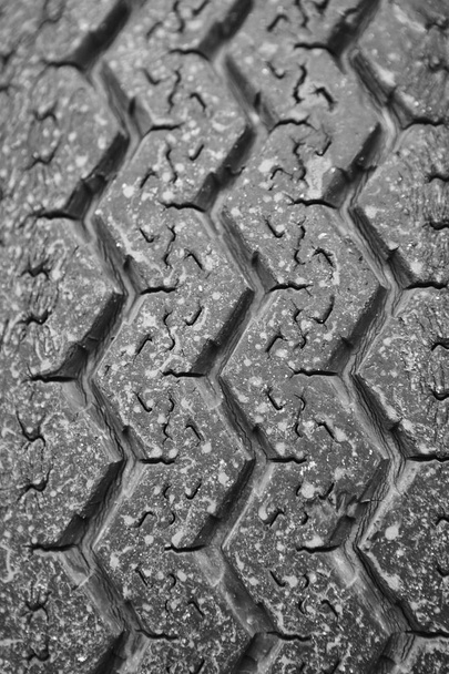 Used tire detail. Damaged wheels. Vehicle parts. Danger - Photo, Image