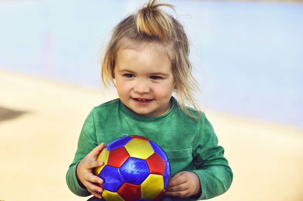 Little boy child playing with ball at beach - Φωτογραφία, εικόνα