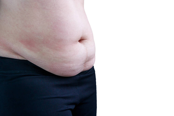 Corpo da mulher com excesso de gordura da barriga, isolado em fundo branco
. - Foto, Imagem
