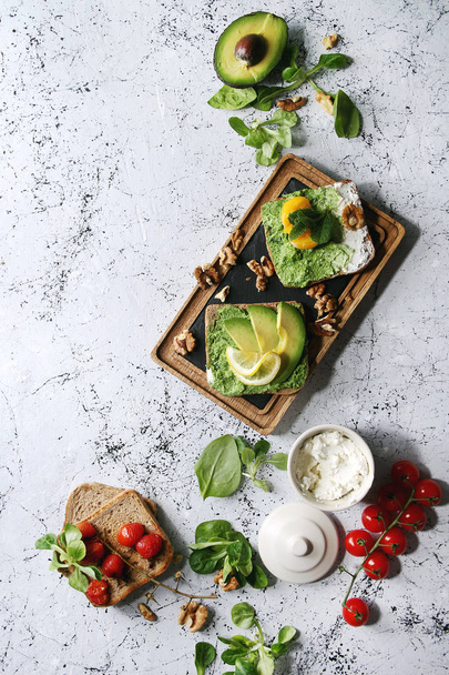 Vegetarian sandwiches with avocado - Фото, изображение