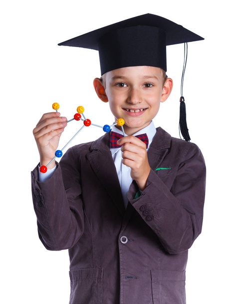 Little boy in academic hat - Valokuva, kuva