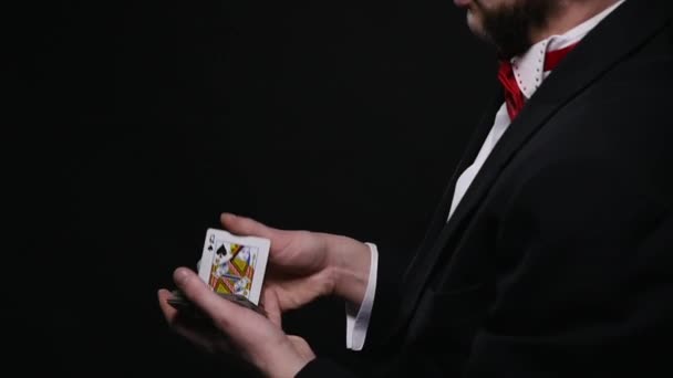 magic, card tricks, gambling, casino, poker concept - man showing trick with playing cards - 映像、動画